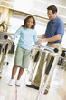 Physiotherapist With Patient In Rehabilitation Physiotherapist With Patient In Rehabilitation