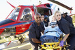 Paramedics unloading patient from Medevac Paramedics unloading patient from Medevac