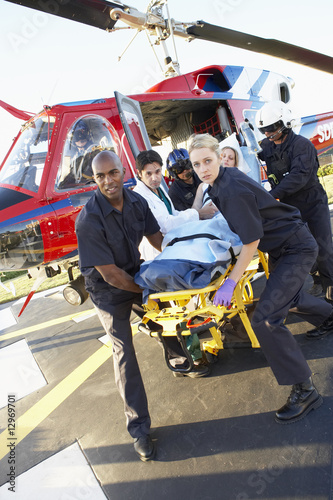 Paramedics unloading patient from Medevac Paramedics unloading patient from Medevac