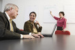 Photo: View of an executive making a presentation to the CEO. View of an executive making a presentation to the CEO.