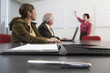 Photo: View of an executive making a presentation to the CEO. View of an executive making a presentation to the CEO.