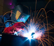 Welder with sparks Welder with sparks