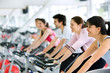 people spinning at the gym