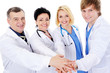 unity of four happy successful doctors