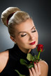 Charming lady with red rose