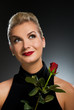 Charming lady with red rose