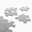 silberne Puzzelteile