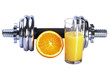 Fresh orange juice and dumbbel Fresh orange juice and dumbbel