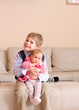 Brother holding little sister
