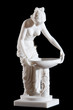 Classic white marble statue of a woman isolated on black Classic white marble statue of a woman isolated on black