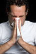 Man Blowing Nose