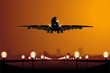 Vector airliner landing at sunset