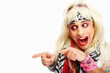 Crazy young rockstar pointing towards copyspace Crazy young rockstar pointing towards copyspace