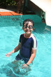 Photo: Girl standing in the pool Girl standing in the pool