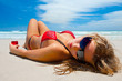 Attractive girl is lying on the beach
