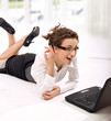 Happy young businesswoman with notebook
