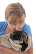 Mature Lady Holding A Pug Dog