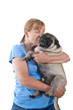 Mature Lady Holding A Pug Dog