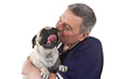 Mature Man Holding Pug Dog, Isolated