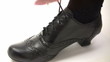Tying a Black Shoe