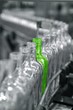 Different unique green bottle in factory line Different unique green bottle in factory line