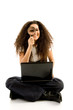 latin american female corporate sitting with laptop and holding latin american female corporate sitting with laptop and holding