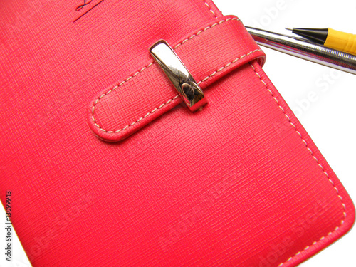 Photo: red notebook isolated red notebook isolated