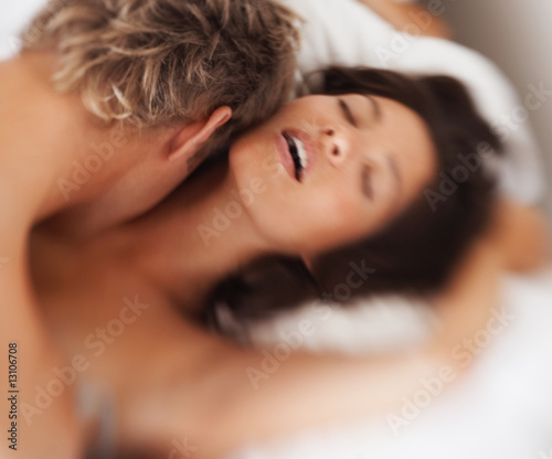 Photo: Passionate couple in love indulging in sexual intercourse Passionate couple in love indulging in sexual intercourse