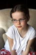 child in glasses
