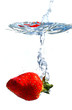 Strawberry splashing water