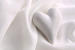 Heart on white silk