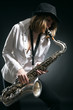 woman play on saxophone woman play on saxophone