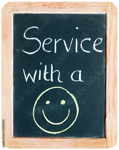Photo: "Service with a Smile" (on blackboard) "Service with a Smile" (on blackboard)