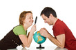 Couple looking at globe