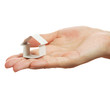 Small house from a paper in a hand Small house from a paper in a hand