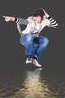 Foto: Teenage boy jumping and dancing Locking or Hip-hop dance Teenage boy jumping and dancing Locking or Hip-hop dance