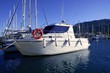Motorboat in blue Mediterranean marina