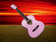 Love guitar at sunset on the beach