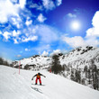 Snowboarding in an alpine landscape