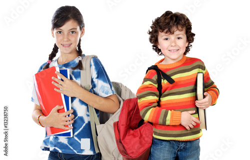 Photo: Two children students returning to school Two children students returning to school