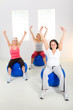 Elder women exercising on fitness balls
