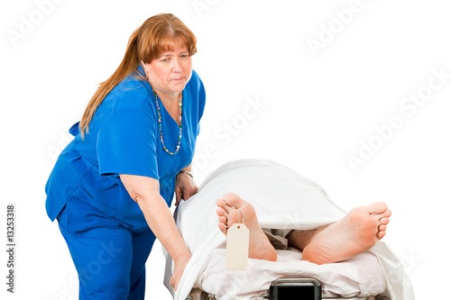 Photo: Nurse Transporting Dead Patient Nurse Transporting Dead Patient