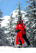 Young couple funning in the ski resort