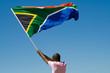 african man waving a south african flag african man waving a south african flag