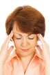 Portrait of beautiful woman with migraine