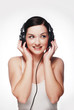 Smiling girl wearing headphones and looking to the side