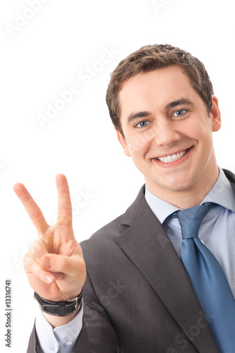Very happy successful gesturing businessman, isolated
