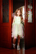 Foto: Little girl enters room Little girl enters room