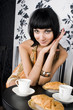 Portrait of the beautiful woman in restaurant