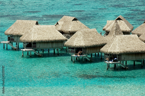 Photo: luxury overwater bungalows at blue lagoon in French Polynesia luxury overwater bungalows at blue lagoon in French Polynesia